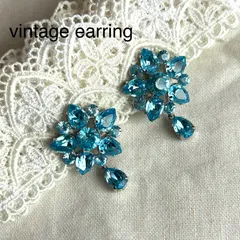 A04023ヴィンテージ 大ぶり水色の雪の結晶みたいなお花イヤリング