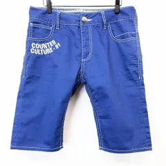 【中古】[印象B] COUNTER CULTURE カウンターカルチャー テーパードショーツ / ショートパンツ / ハーフパンツ メンズ M ブルー 青 ジップフライ バックプリント ロゴ刺繍 裾裏に民族柄プリントのサムネイル
