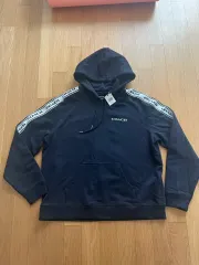 COACH ネイビー ロゴ テープ WHO Tシャツ 新品 Sのサムネイル