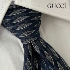 美品》GUCCI (グッチ) シルクネクタイ イタリア製 総柄 リーフモチーフ 