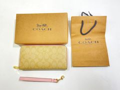 新品✨COACH 長財布 シグネチャー イエロー ストラップ付 箱・袋あり