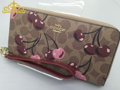 COACHコーチシグネチャーストロベリー苺柄ロングウォレット長財布