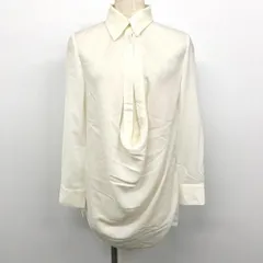 【中古】[印象AB] SHAKE SHAKE ブラウス / シャツ レディース ライトアイボリー オフホワイト系 生成り系 ポリ100% 透け感 裾のサイドにスリット 袖ロールアップ 薄手 フロントスリット 無地 長袖のサムネイル