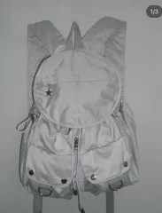 ヌウェ grey round pocket backpack バッグ