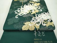 スリーシーズン 新品 西陣織六通柄袋帯 黒地 彼岸花【綿芯御仕立付 