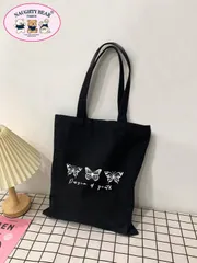 バッグ レディース トートバッグ 蝶柄とレター プリントのショッピングバッグ スクールバッグ、大容量、クラシックカジュアル、折りたたみ式、ポータブル、ティーンガールズ、女性、大学生に適しています。バックトゥースクー