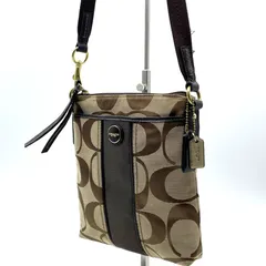 コーチ COACH ショルダーバッグ シグネチャー キャンバス ブラウン ベージュ 斜め掛け クロスボディ レディース メンズ ユニセックス レザー切替 ロゴチャーム付き コンパクト 軽量 お出かけ 普段使い 人気 定番 おしゃれ 高級感