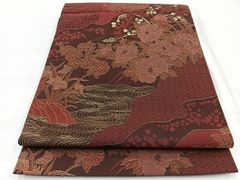 美品 赤茶系の唐織袋帯 四季草花 松竹梅 菊 吉祥文様 セミフォーマル