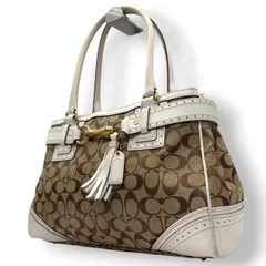 コーチ COACH ハンドバッグ トートバッグ シグネチャー キャンバス レザー 本革 ベージュ ホワイト 白 ゴールド金具 ワンショルダー 自立可 タッセル クラシック エレガント ヴィンテージ ビンテージ 鞄 カバン レディース 10508 s23
