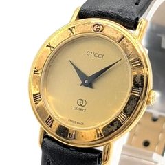 稼働品】GUCCI グッチ 腕時計 ゴールド ローマンベゼルA56 - メルカリ