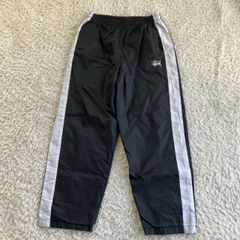 Old stussy 90'sナイロントラックパンツ - メルカリ