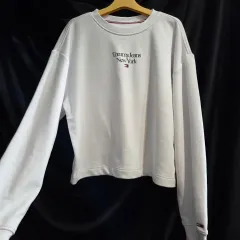 トミー ジーンズ オーバーサイズ スウェットシャツ