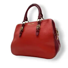 【美品】ミュウミュウ miumiu ハンドバッグ 2way ショルダーバッグ レザー オレンジ 朱色 暖色系 ゴールド金具 ロゴ 刻印 本革 鞄 カバン レディース カジュアル エレガント 華やか 高級感 デート お出かけ 自立可 斜め掛け可 美品 S99
