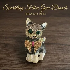 【B142】キラキラ猫のブローチ ハンドメイド パーツ ビジュー ヴィンテージ風 ネコ 1個