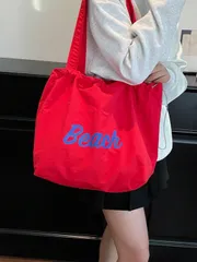 バッグ レディース ショルダーバッグ 2026年新作 巾着バッグ、大容量 ショルダーバッグ、和文字プリント、ナイロン素材、ハンドバッグ、トートバッグ、通勤に適しています