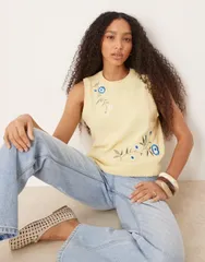 エイソス レディース トップス タンクトップ ニット ASOS DESIGN knit tank top with embroidery in yellowイエロー