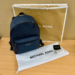 未使用級・保存袋付】MICHAEL KORS リュック ロゴ総柄 - メルカリ