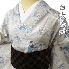 ⭐︎美品⭐︎長井紬 黒地 北限の紬 渡源織物 十時絣模様 証書あり