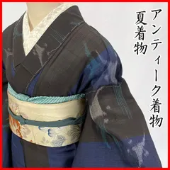 紗紬 夏着物 琉球絣“モスグリーンの夏風に乗るトゥイグワー”絹芭蕉N-94 紗紬 夏着物 琉球絣“モスグリーンの夏風に乗るトゥイグワー”絹芭蕉N-94
