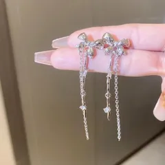 ピアス レディース リボン 蝶々 ロングピアス 揺れる チェーン ピアス キラキラ 韓国風 大人可愛い 上品 華やか 小顔効果 デート カフェ お出かけ 女子会 夜 パーティー 結婚式 二次会 誕生日 クリスマス バレンタイン プレゼント ギフト 人気