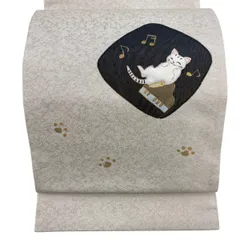 【美品】 袋帯 逸品 猫 ピアノ 金彩 和キルト ベージュ お太鼓柄 正絹 【中古】のサムネイル