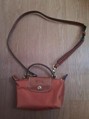 h*i様 longchamp ロンシャン ポーチ ショルダー コニャック - メルカリ