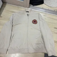 アイボリー ブルゾン ジャケット