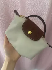 ロンシャン ル プリアージュ アイボリー トップスハンドル ポーチ