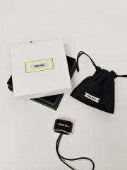 miumiuエナメルメタル ヘアクリップ ブラック 購入証明書付き - メルカリ