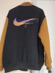 Nike スタジャン ベージュ刺繍ロゴ - メルカリ