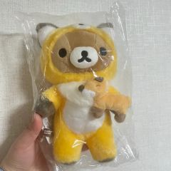 【未開封タグ付き新品】リラックマ抱っこ型ポシェット　ぬいぐるみ　匿名配送　ポーチ 未開封タグ付き新品】リラックマ抱っこ型ポシェット ぬいぐるみ 匿名