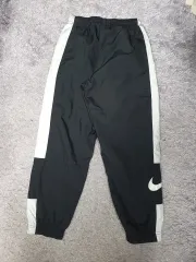 ナイキ ズボン レペル エッセンシャルズ GX ミッドライズ ウーブン ジョガー パンツ ブラック s
