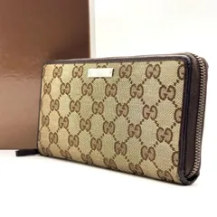 【整う余白と気品】　GUCCI　長財布 ラウンドファスナー GGキャンバス 12カード シルバープレート 　ブラウン