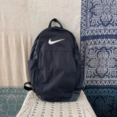 NIKE JUST DO IT. 大容量リュック ブラウンピンク - メルカリ