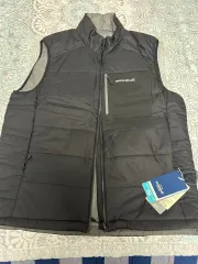 新品 モンベル サーマラップ ダウンベスト