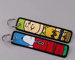 新品) SNOOPY チャーリー・ブラウン リバーシブル 刺繍 キーホルダー