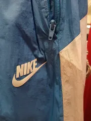 7/6 NIKE ウーブン トラック パンツ ブルー M