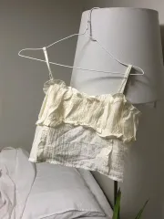 アイボリー フリル ノースリーブ