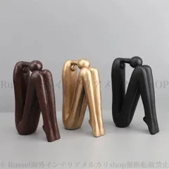 現代的でシンプルな円形の人形置物