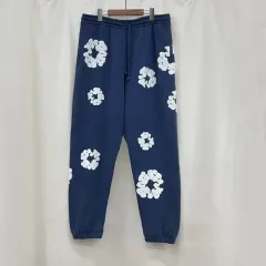 DENIM TEARS スウェット パンツ