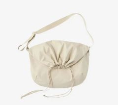 新品タグ付き AURALEE × AETA 巾着ショルダーバッグ クリーム色 - メルカリ