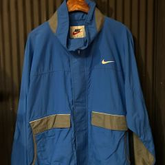 NIKEナイキナイロントラックジャケットジップブルゾン水色ライトブルー