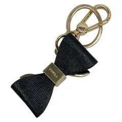 FURLA(フルラ) キーホルダー(チャーム) - ゴールド×黒 リボン レザーのサムネイル