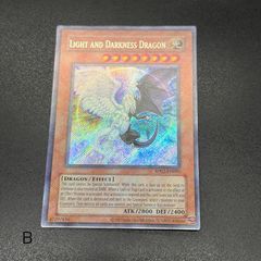 遊戯王 光と闇の竜 英語版 シークレットレア YG01-EN001 - メルカリ