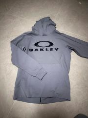 OAKLEY グレー フード付きパーカー Lサイズ 値段交渉是非！ - メルカリ