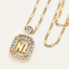 【美品】NINA RICCI　ニナリッチ　NR　ロゴネックレス　ストーン付き　ゴールドカラー