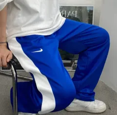 ナイキ サイドボタン トラックパンツ
