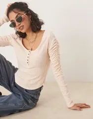 フリーピープル レディース アウター カーディガン リブ Free People hope henley ribbed long sleeve top in light PINK ピンクのサムネイル