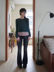DKNY シアー素材 ストレッチ性のありノースリーブトップス クリーム色 