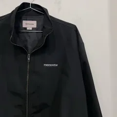 thisisneverthat バックプリント ハイネック ナイロン ジャケット